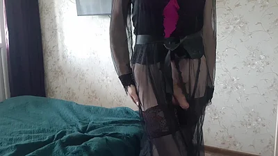 Seducing in a black sheer robe